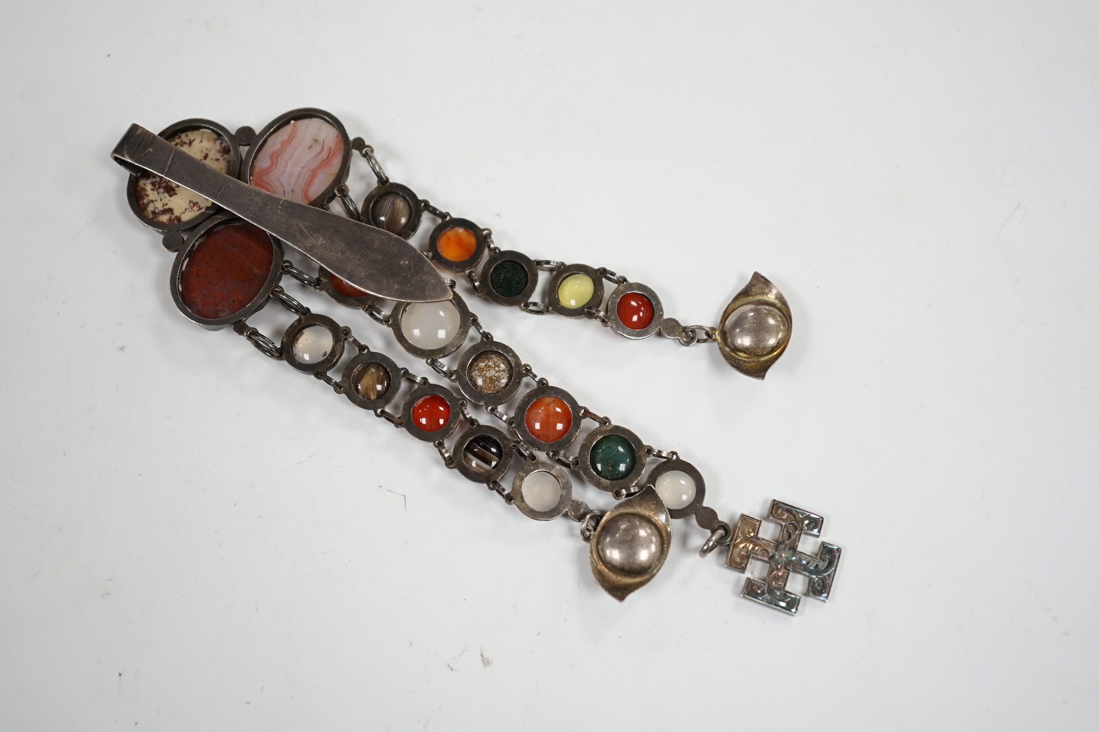 A white metal and cabochon multi gem set chatelaine, including jasper, carnelian and banded agate, 17cm.